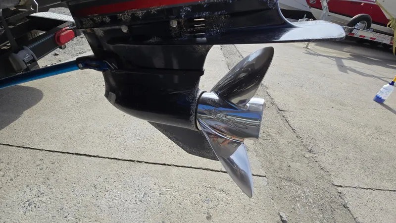 Slide: The Image of 2017 Skeeter ZX 250 boat propeller on concrete surface, close-up view. - 24