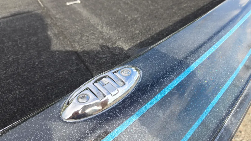 Slide: The Image of 2017 Skeeter ZX 250 boat deck with metallic finish and blue stripe detailing. - 29