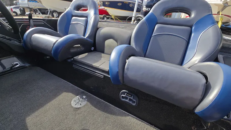 Slide: The Image of 2017 Skeeter ZX 250 boat interior with blue and black seating. - 36