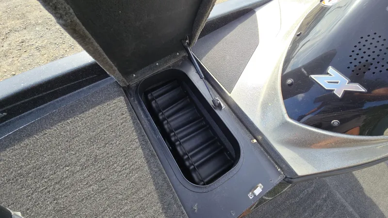 Slide: The Image of 2017 Skeeter ZX 250 boat storage compartment open, showing interior details. - 42