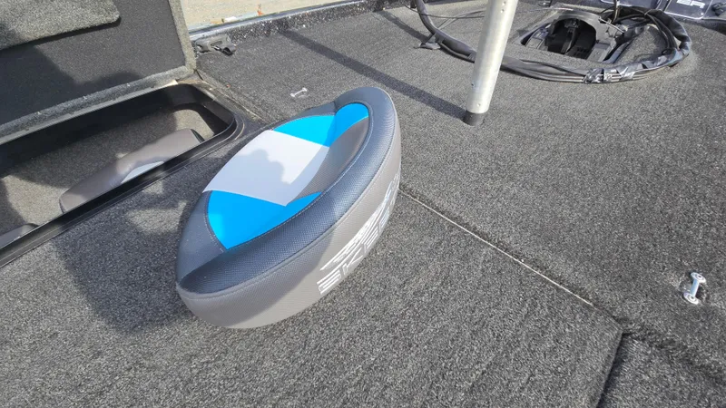 Slide: The Image of 2017 Skeeter ZX 250 boat deck with blue and gray seat cushion. - 47