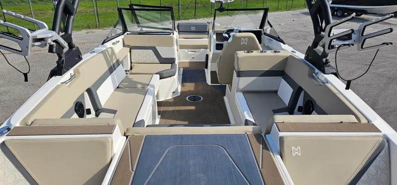 Slide: The Image of 2025 Heyday H22 boat interior with beige seating and modern design features. - 16