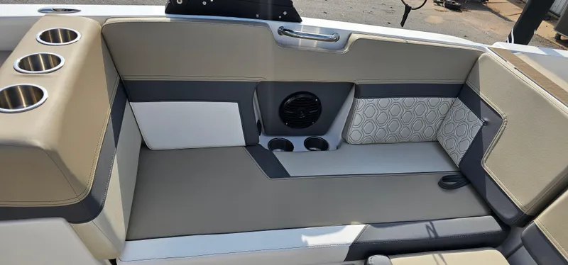 Slide: The Image of Interior seating of 2025 Heyday H22 boat with cup holders and speaker. - 18