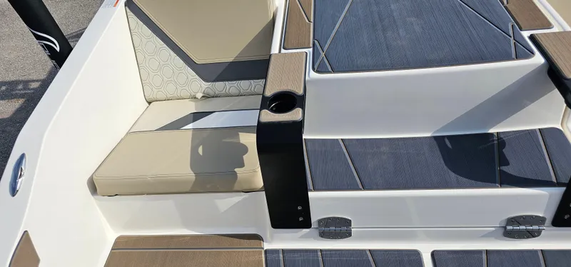 Slide: The Image of 2025 Heyday H22 boat interior with beige seating and modern design elements. - 19