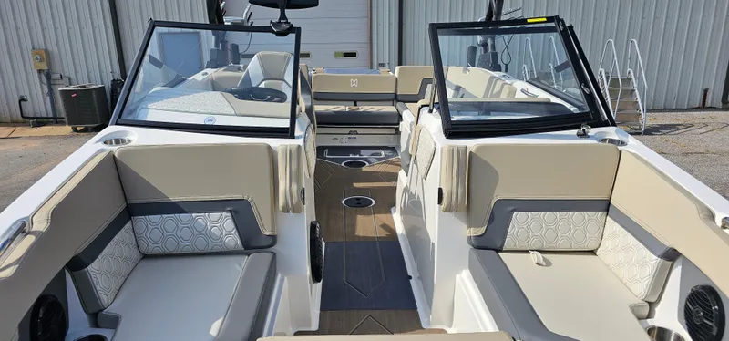 Slide: The Image of 2025 Heyday H22 boat interior with beige seating and modern design. - 3