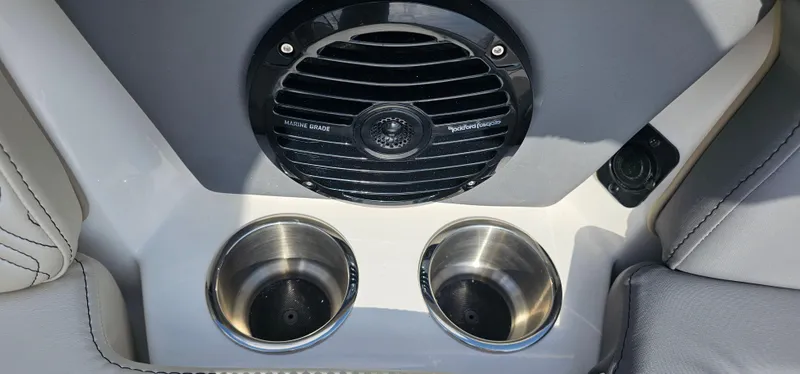 Slide: The Image of 2025 Heyday H22 boat interior with marine-grade speaker and dual cup holders. - 5