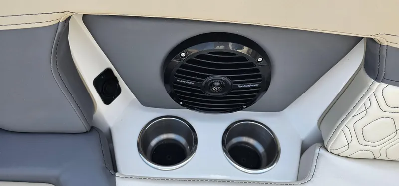 Slide: The Image of Interior of 2025 Heyday H22 boat with speaker and dual cup holders. - 6