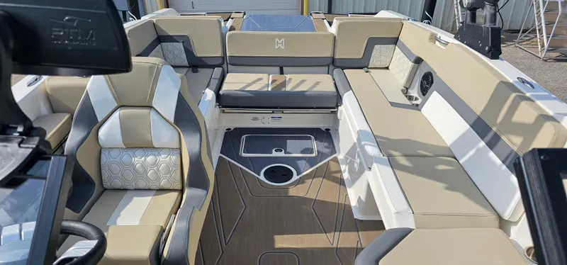 Slide: The Image of 2025 Heyday H22 boat interior with beige and gray seating, modern design, and spacious layout. - 7