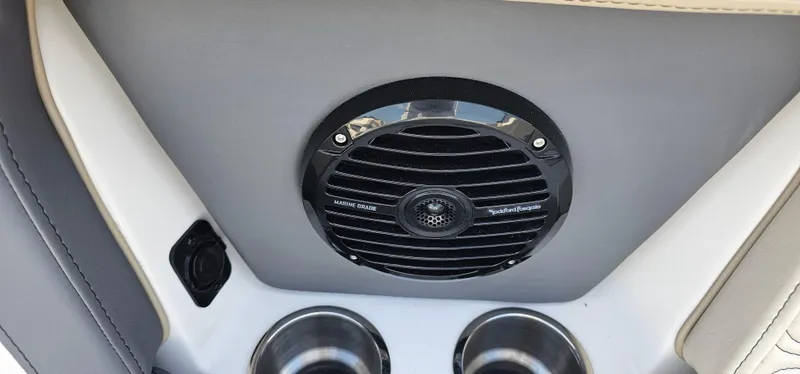 Slide: The Image of Marine speaker and cup holders in 2025 Heyday H22 boat interior. - 9