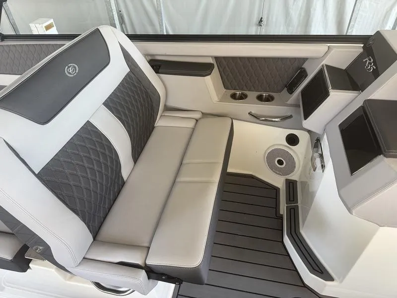 Slide: The Image of Luxurious interior seating of 2026 Cobalt R35 boat with quilted upholstery and cup holders. - 11