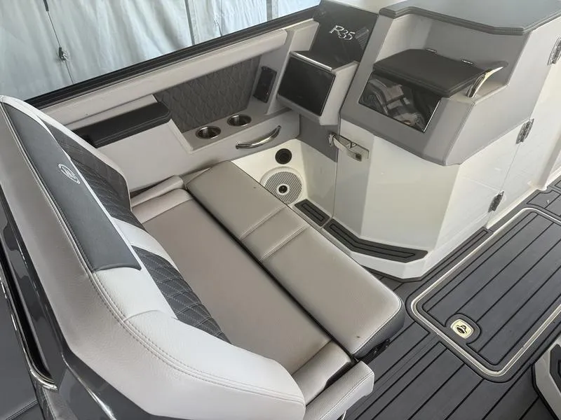 Slide: The Image of Interior of 2026 Cobalt R35 boat with luxurious seating and modern design. - 6