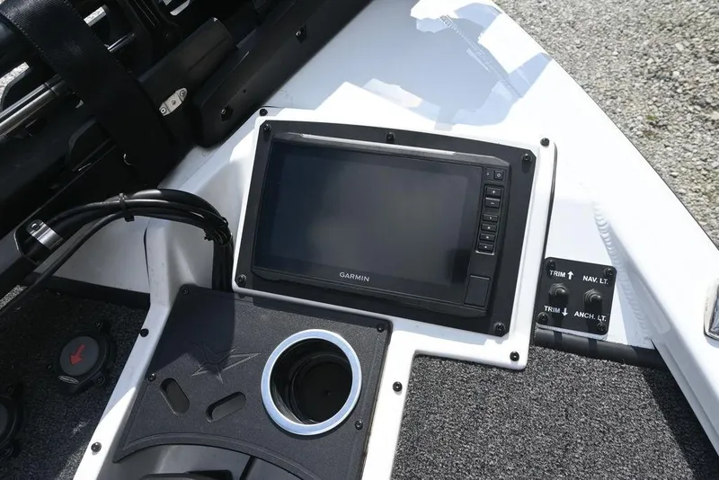 Slide: The Image of 2021 Vexus AVX2080 boat dashboard with Garmin display and control switches. - 10
