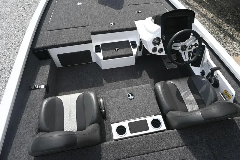 Slide: The Image of 2021 Vexus AVX2080 boat interior with dual seats and steering console. - 12