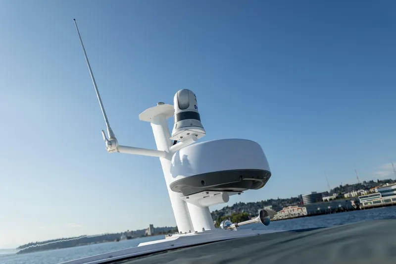 Slide: The Image of Rooftop equipment on 2021 Axopar 37XC Aft Cabin boat against clear blue sky. - 13