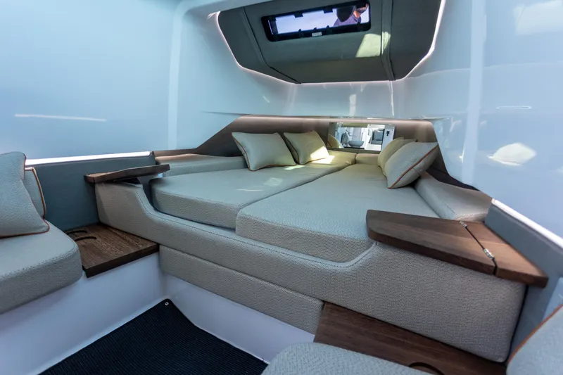 Slide: The Image of Luxurious interior of 2021 Axopar 37XC Aft Cabin with comfortable bedding and modern design. - 29