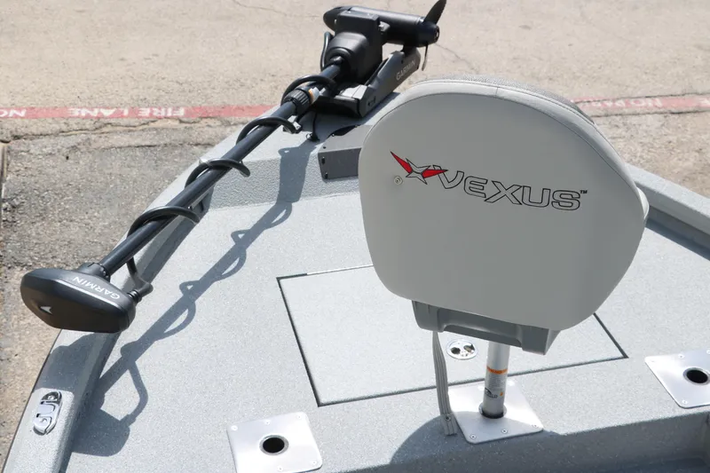Slide: The Image of 2025 Vexus ACX 2000 boat with Garmin trolling motor and branded seat. - 16