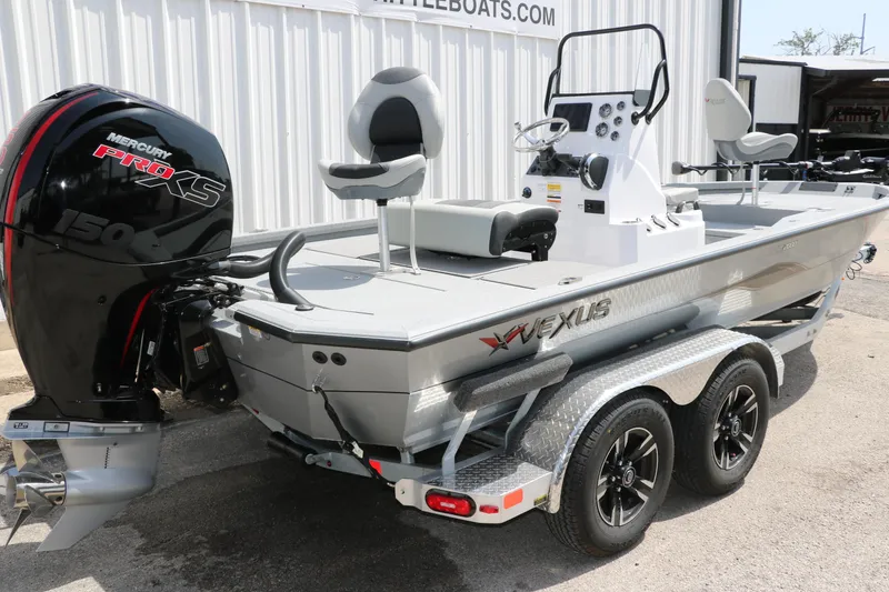 Slide: The Image of 2025 Vexus ACX 2000 boat with Mercury Pro XS 150 engine on a trailer. - 3