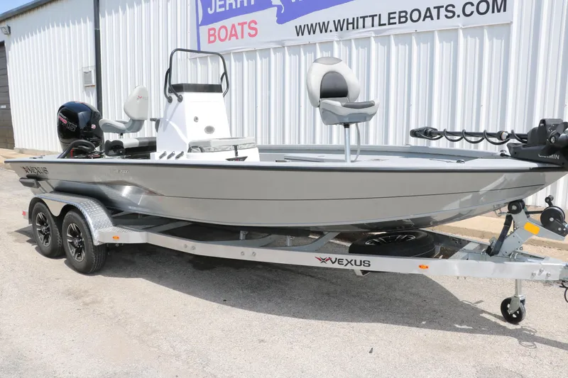 Slide: The Image of 2025 Vexus ACX 2000 boat on trailer, parked outside Whittle Boats dealership. - 4