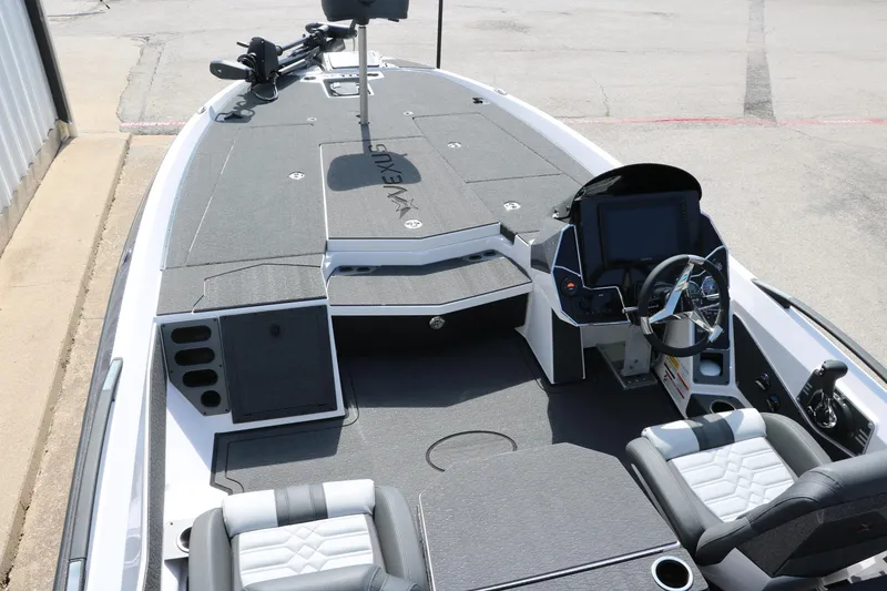 Slide: The Image of 2025 Vexus VXS 21 boat interior with modern dashboard and seating. - 11