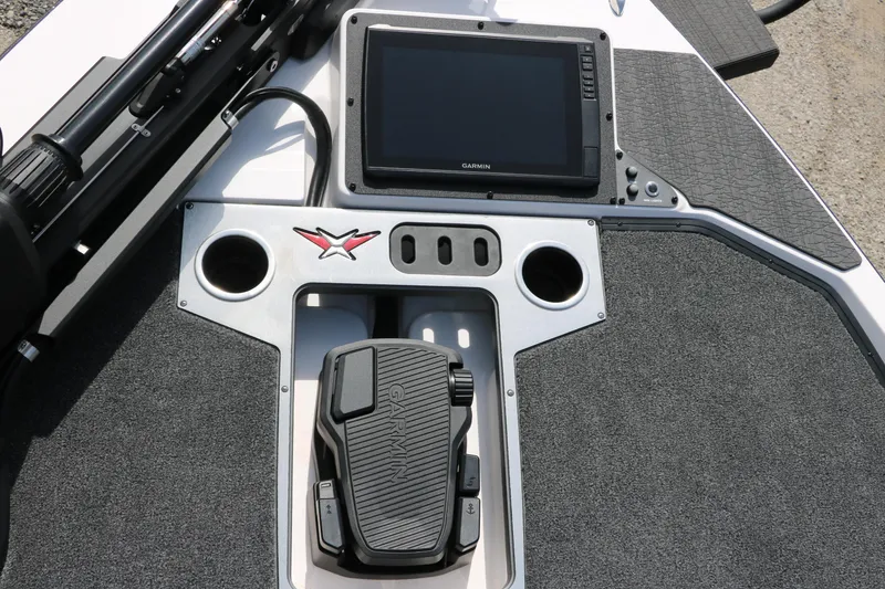 Slide: The Image of 2025 Vexus VXS 21 boat console with Garmin display and foot pedal controls. - 18