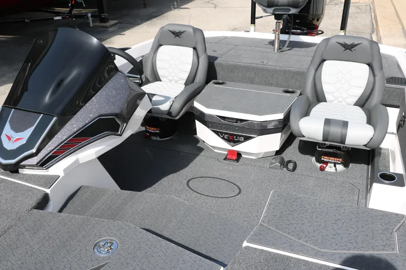 Slide: The Image of 2025 Vexus VXS 21 boat interior with sleek seating and modern dashboard design. - 20