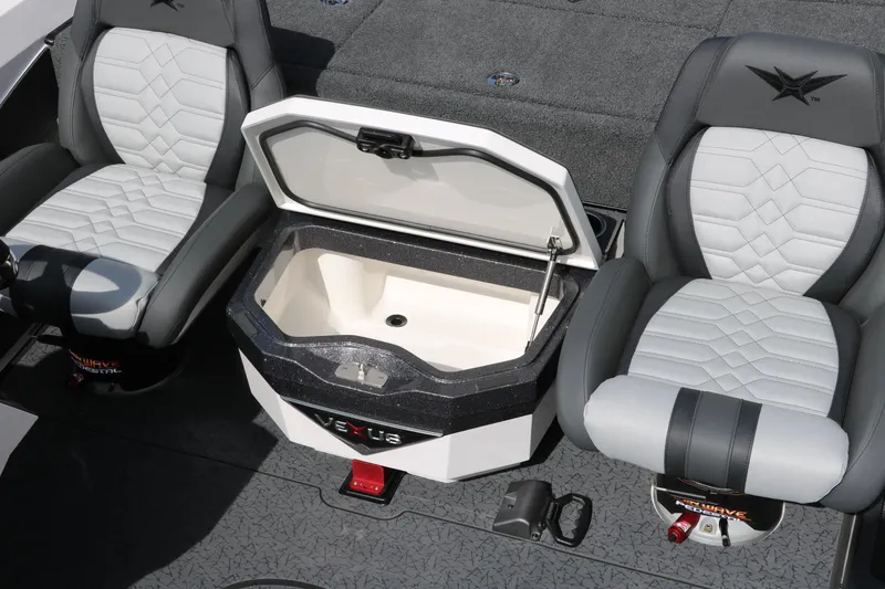 Slide: The Image of 2025 Vexus VXS 21 boat interior with open storage compartment and two gray seats. - 23