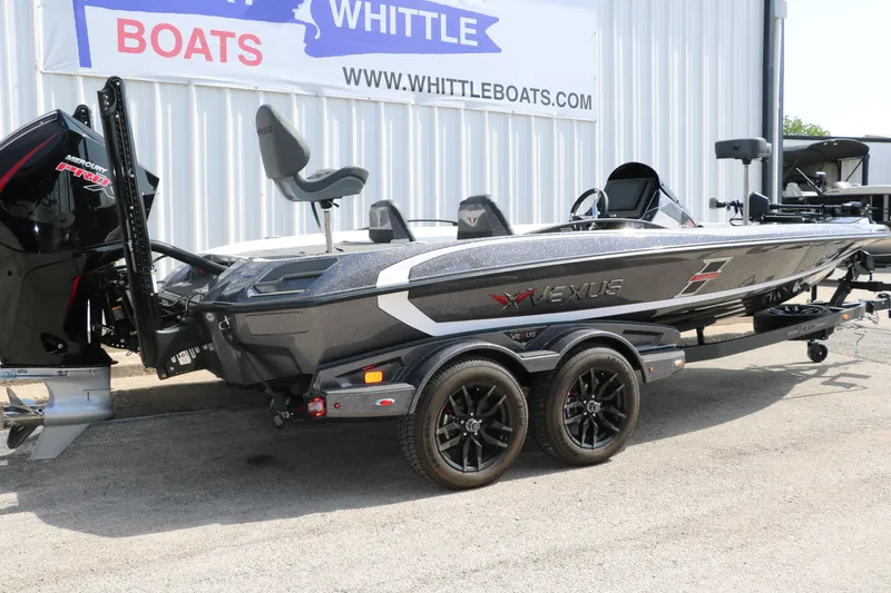 Slide: The Image of 2025 Vexus VXS 21 boat on trailer at Whittle Boats dealership. - 3
