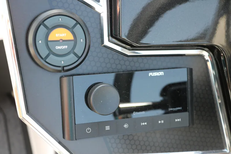Slide: The Image of Control panel of 2025 Vexus VXS 21 boat with start button and Fusion audio system. - 33