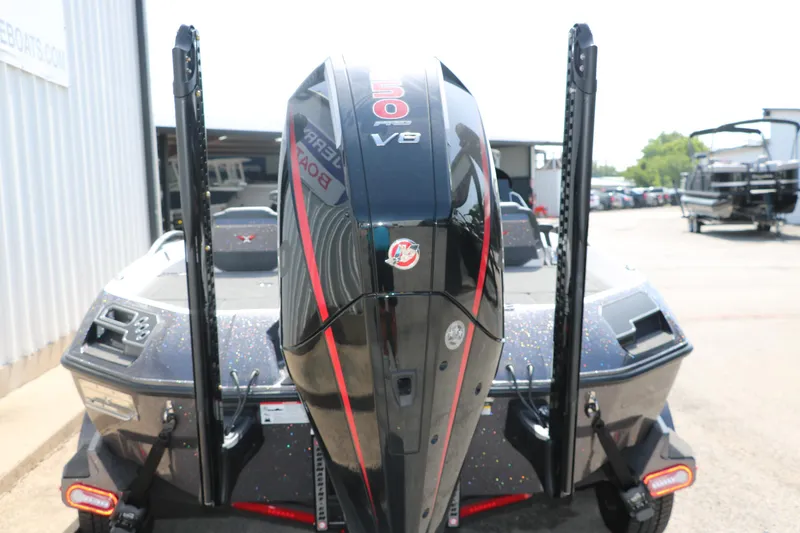 Slide: The Image of 2025 Vexus VXS 21 boat with powerful V8 engine, parked outdoors. - 8