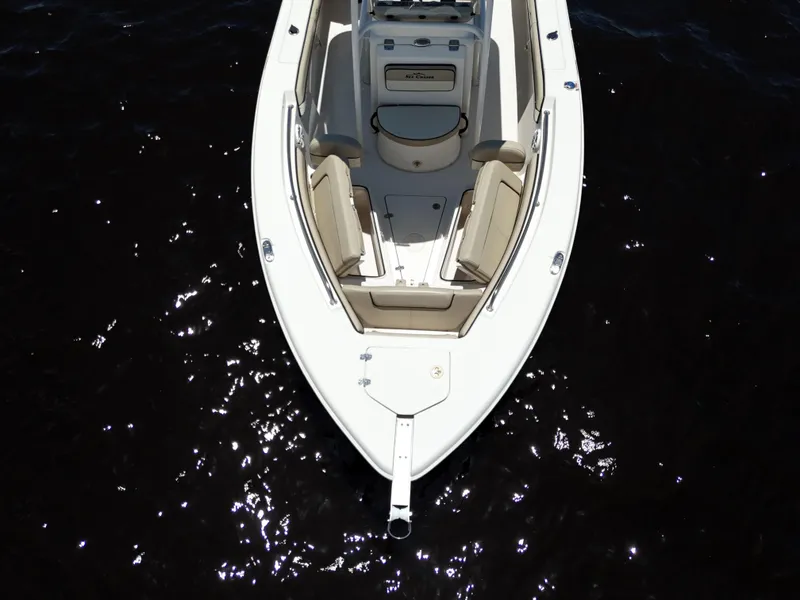 Slide: The Image of 2021 Carolina Skiff Sea Chaser 22 HFC boat, aerial view on dark water. - 22
