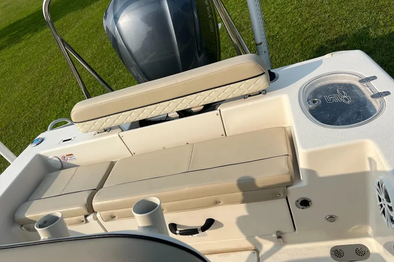 Slide: The Image of 2021 Carolina Skiff Sea Chaser 22 HFC boat interior with seating and storage. - 29