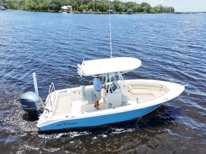 Slide: The Image of 2021 Carolina Skiff Sea Chaser 22 HFC boat cruising on a sunny day. - 4