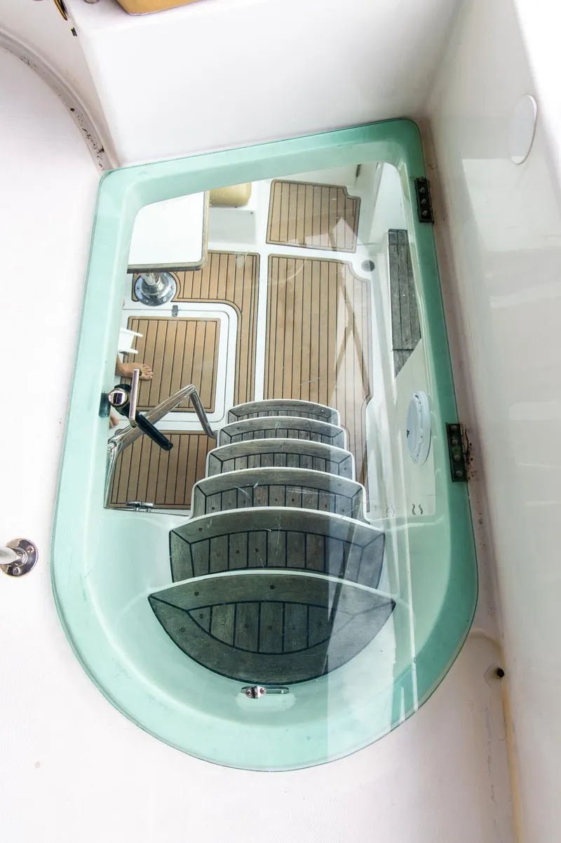 Slide: The Image of Glass hatch with wooden steps on a 2002 Dyna 50 yacht. - 19