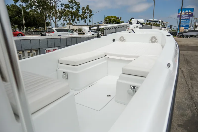 Slide: The Image of 2022 Banks Panga 24 boat interior with white seating and modern design. - 6