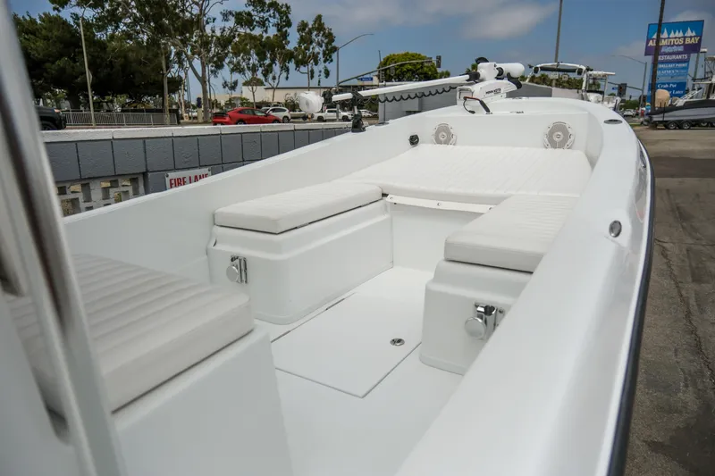 Slide: The Image of 2022 Banks Panga 24 boat interior with white seating and modern design. - 7