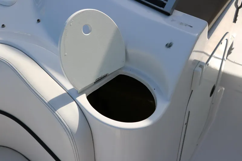 Slide: The Image of 2008 Four Winns 224 Funship boat cup holder with open lid. - 22
