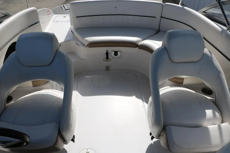 Slide: The Image of 2008 Four Winns 224 Funship boat interior with white seating and spacious layout. - 23