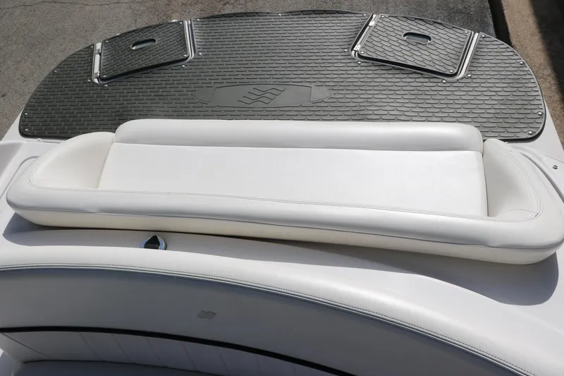 Slide: The Image of 2008 Four Winns 224 Funship boat with white seating and textured deck. - 24