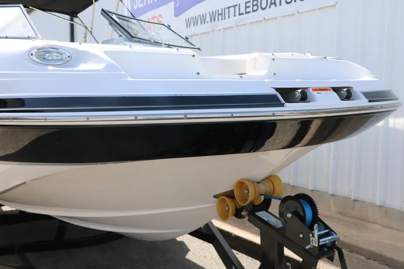 Slide: The Image of 2008 Four Winns 224 Funship boat on trailer, close-up of bow and winch. - 37