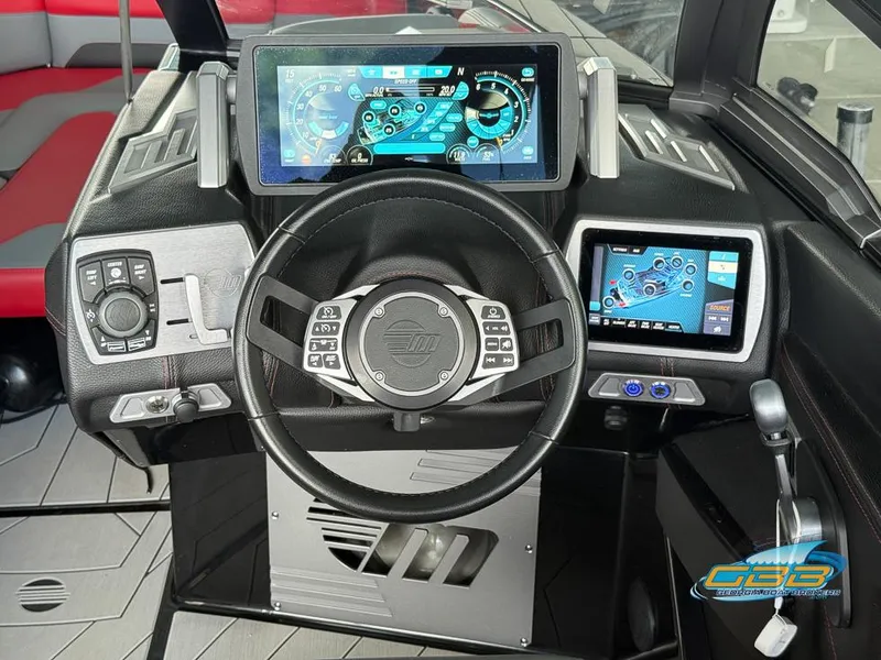 Slide: The Image of 2019 Malibu M235 dashboard with advanced digital displays and controls. - 17
