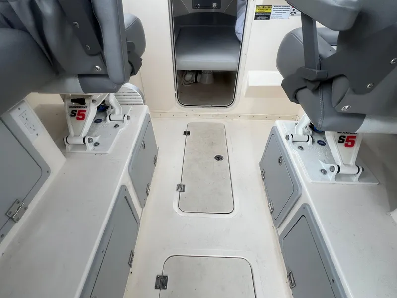 Slide: The Image of Interior of 2021 Defiance Admiral 250 EX boat with Shockwave S5 seating. - 21