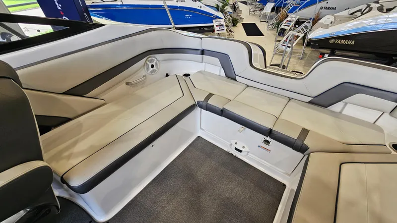 Slide: The Image of 2020 Yamaha Boats SX240 interior seating with sleek design and comfortable upholstery. - 10