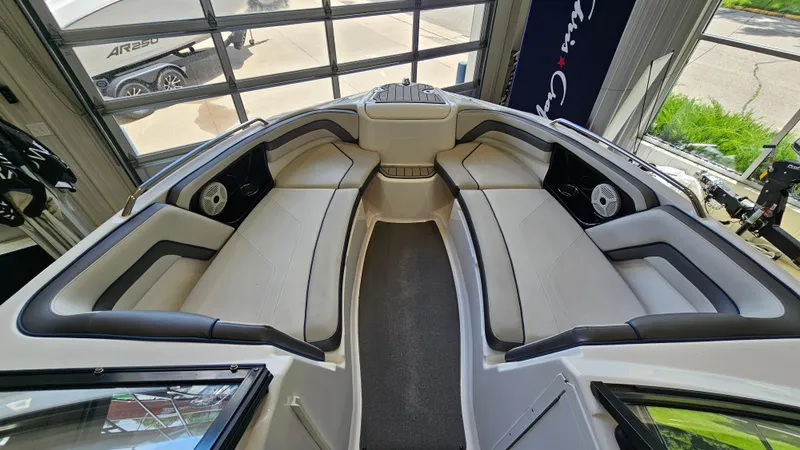 Slide: The Image of Interior view of 2020 Yamaha Boats SX240, featuring spacious seating and modern design. - 17