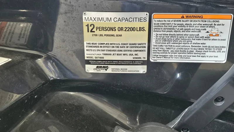 Slide: The Image of Yamaha Boats SX240 2020 capacity and safety warning labels, maximum 12 persons or 2200 lbs. - 28