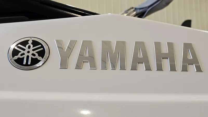 Slide: The Image of Close-up of 2020 Yamaha SX240 boat logo and emblem on white surface. - 30