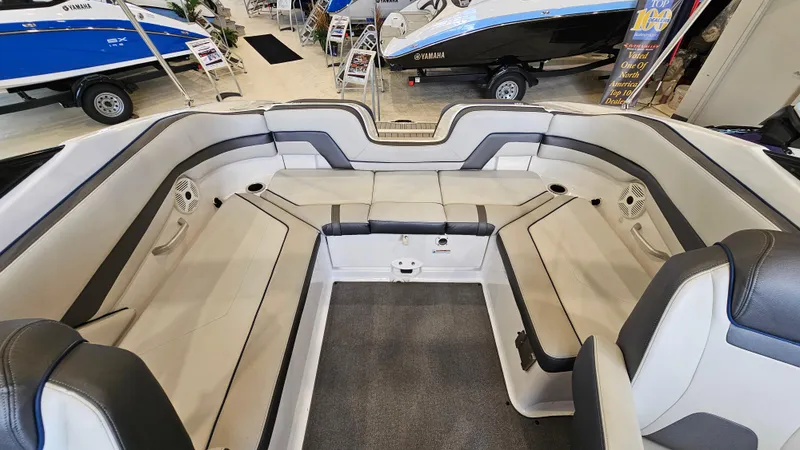 Slide: The Image of 2020 Yamaha Boats SX240 interior with spacious seating and modern design. - 8