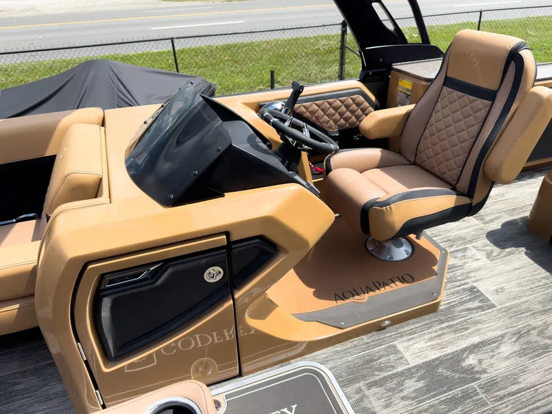 Slide: The Image of Luxurious seating on 2026 Godfrey AquaPatio 23' Flip Lounge Tritoon boat, featuring elegant design. - 14