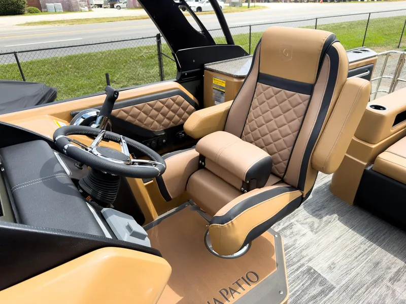Slide: The Image of Luxurious seating and illuminated cup holder in 2026 Godfrey AquaPatio 23' Flip Lounge Tritoon. - 15