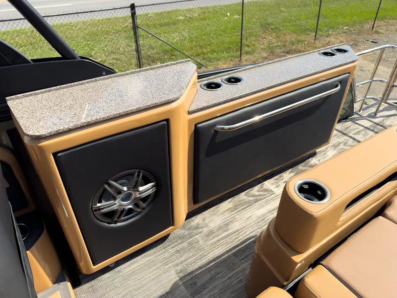 Slide: The Image of Interior of 2026 Godfrey AquaPatio 23' Tritoon with audio system and ambient lighting. - 27