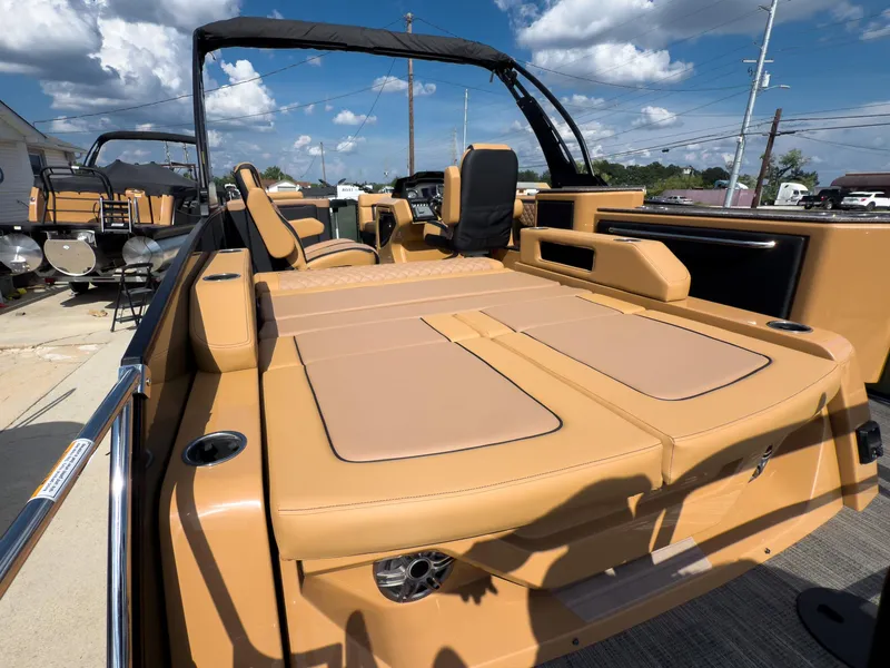 Slide: The Image of Luxurious interior of 2026 Godfrey AquaPatio Tritoon with cup holders and quilted upholstery. - 39